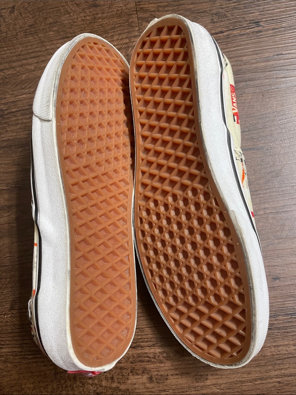 Vans Slip-On Sneakers in Cream with Red & Black Logo Print - Picture 2 of 4